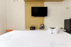 Simple and Comfort Studio at Riverview Jababeka Apartment By Travelio